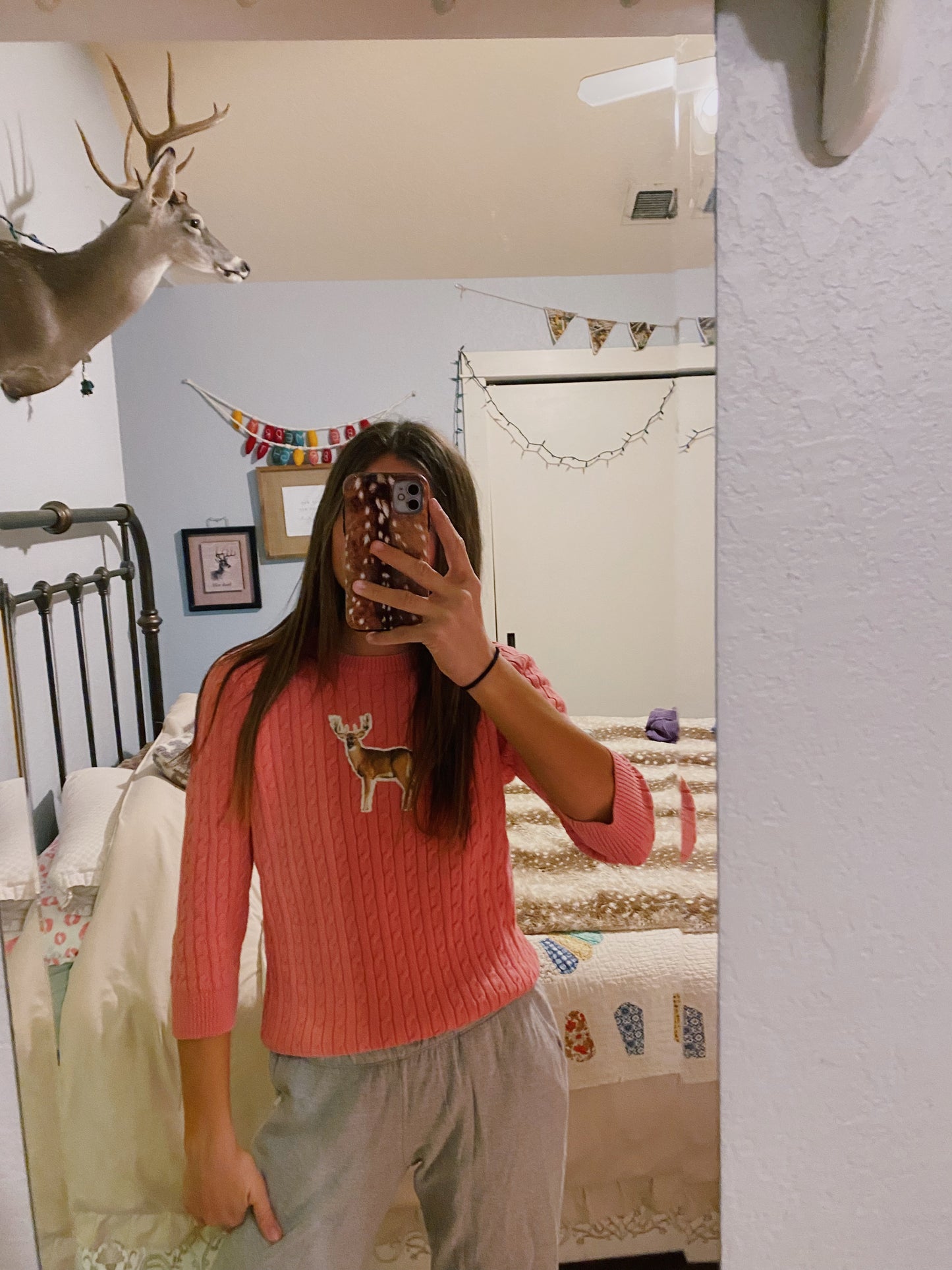 Pink deer sweater