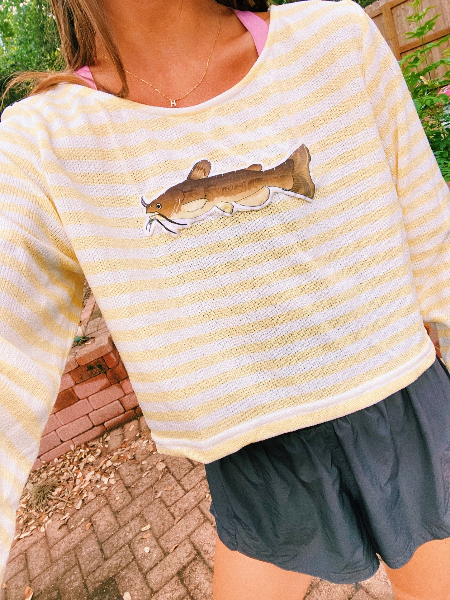 Yellow striped catfish sweater