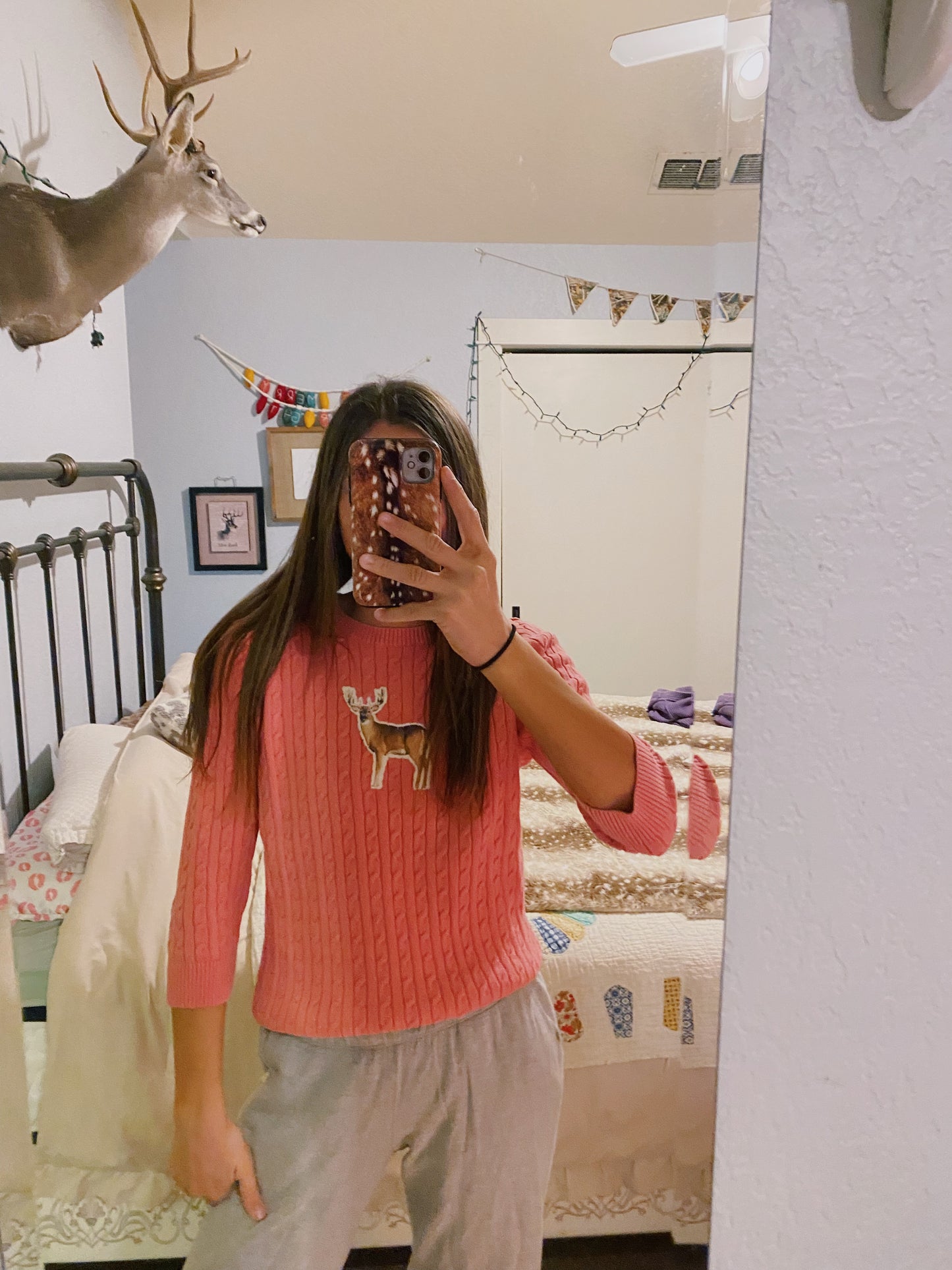 Pink deer sweater