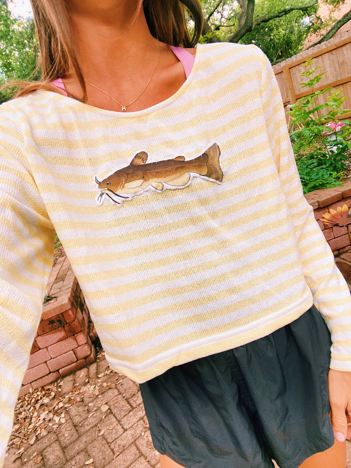 Yellow striped catfish sweater